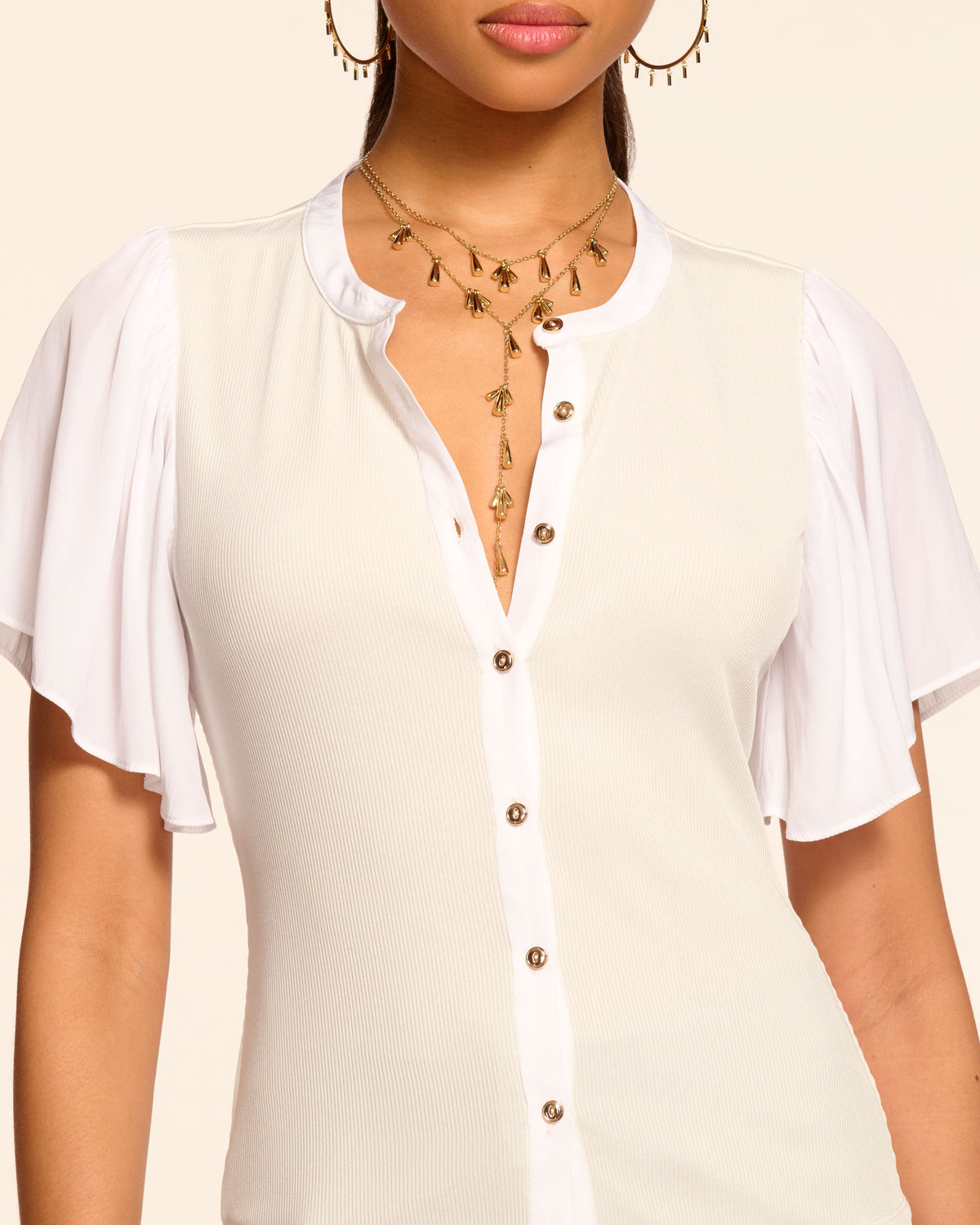 Delicate Flutter Sleeve Ribbed Knit Top